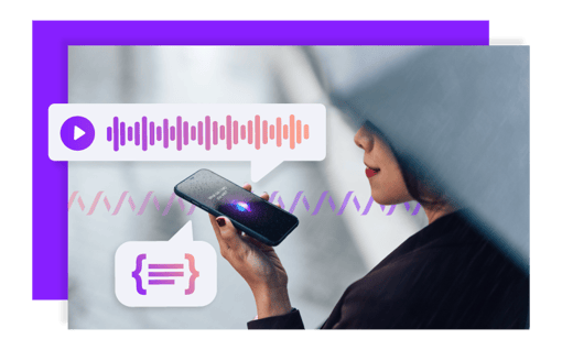 Image of woman holding mobile device and speaking into it.