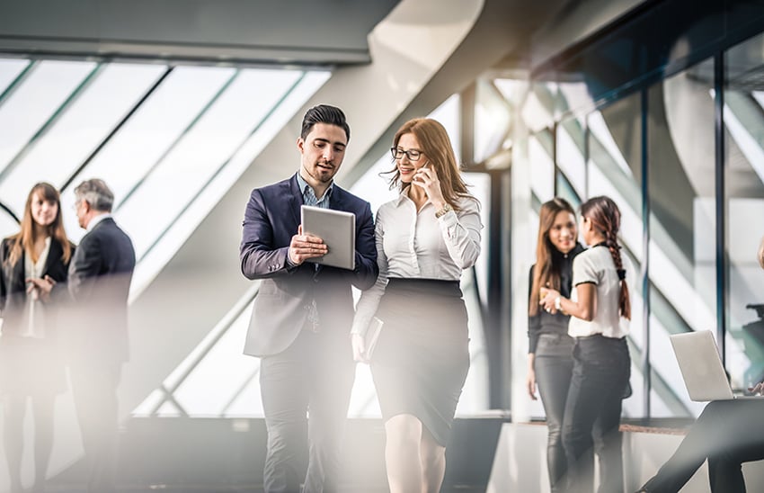 Business People Discussing in Office Setting